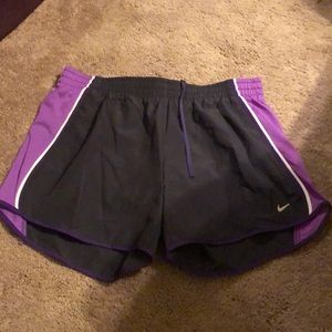 Gray and purple Nike shorts